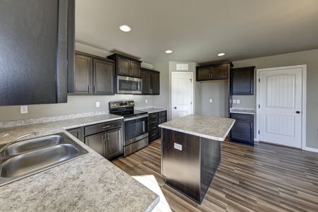 Sky Ranch – Highland Collection by Challenger Homes in Watkins - photo 10 10