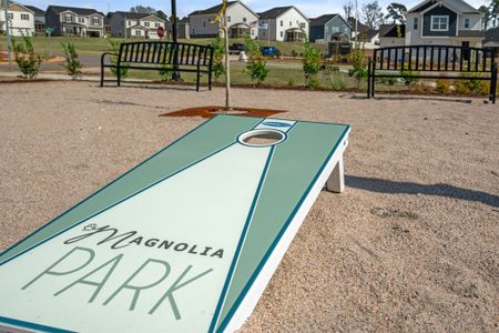 Grab a game of cornhole at our community gathering space