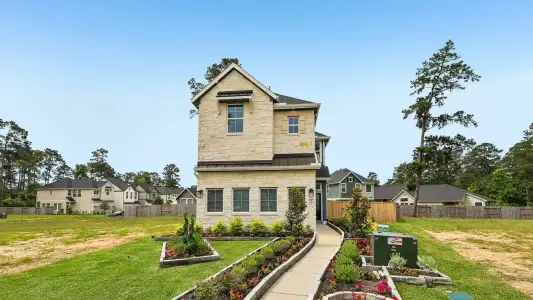The Woodland Hills Chateau by Chesmar Homes in Willis - image