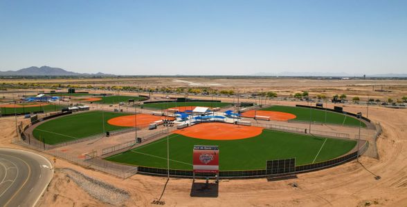 A circular field containing three baseball diamonds