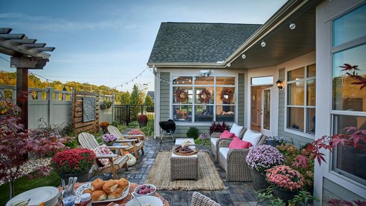 The Courtyards at Redbud Lane by Epcon Communities in Holly Springs - photo 6 6