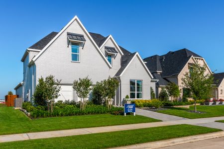 Plan 1640 Front Elevation - Mosaic 60s Model - Photo by American Legend Homes