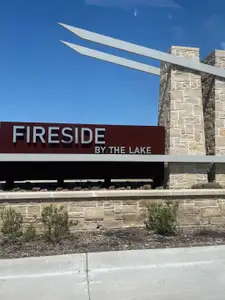 A welcoming entrance sign of Fireside by the Lake by D.R. Horton in Garland, TX, framed by stone pillars and landscaping. A welcoming entrance sign of Fireside by the Lake by D.R. Horton in Garland, TX, framed by stone pillars and landscaping.