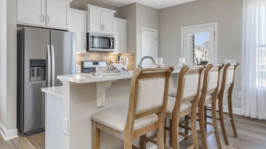 Whitley Corner Townhomes by DRB Homes in Clayton - photo 18 18