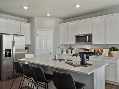 Ridgeline Vista: The Flora Collection by Meritage Homes in Brighton - photo 54 54