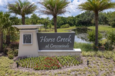 Community signage at the front of the Horse Creek at Crosswinds community with nice landscaping