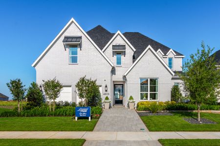 Plan 1640 Front Elevation - Mosaic 60s Model - Photo by American Legend Homes