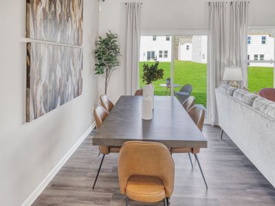 Dining area in the Amber floorplan at a Meritage Homes community in Graham, NC.