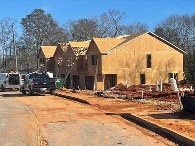 New construction Townhouse house 11596 E Lovejoy Rd, Hampton, GA 30228 - photo 0