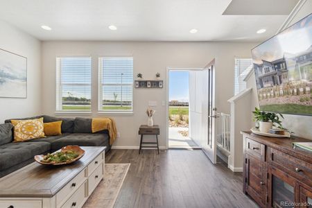 Front entrance to spacious open concept main level living room