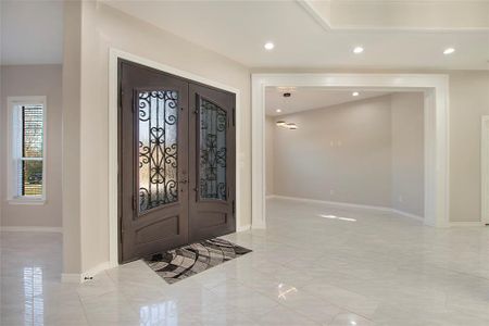 Entryway featuring french doors