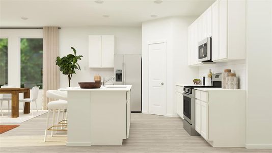 Kitchen with a breakfast bar area, appliances with stainless steel finishes, an island with sink, white cabinets, and decorative backsplash