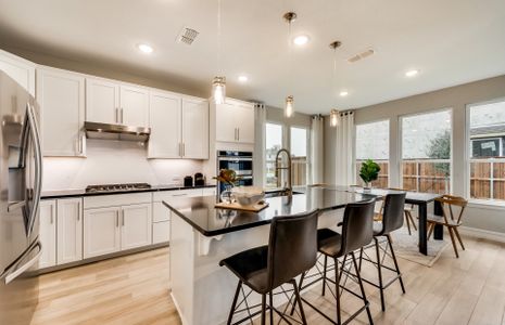 Spacious kitchen with view of dining area