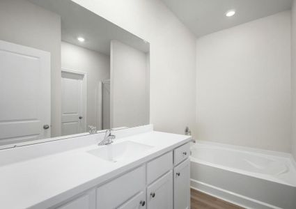 A long vanity in the master bathroom.