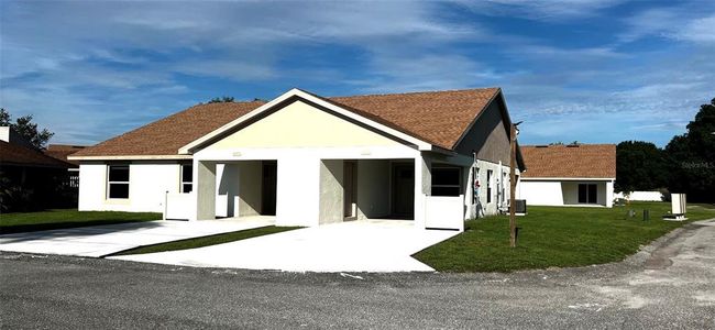 New construction Duplex house 4056 Oak Lp, Unit 100, Mulberry, FL 33860 null- photo 0