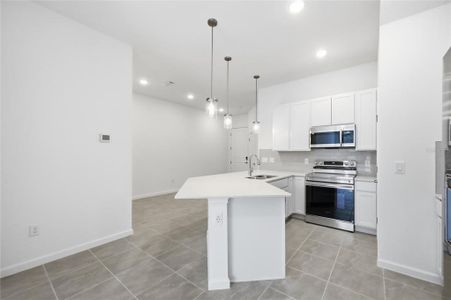 New construction Townhouse house 10556 Ebb Tide Ln, Orlando, FL 32821 - image 11