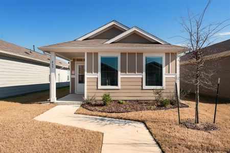 Bungalow-style house featuring a front lawn