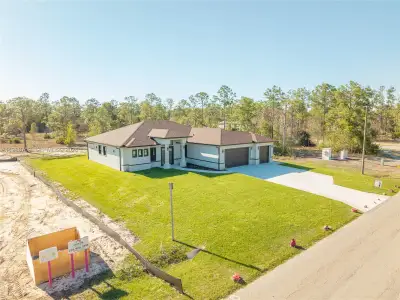 New construction Single-Family house 121 Moore Ave, Lehigh Acres, FL 33936 - image