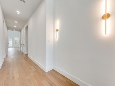 Corridor featuring light hardwood / wood-style floors