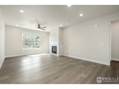 Bright, large living room w/ extended hardwood.