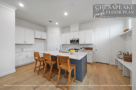 Culinary Paradise: A chef's dream kitchen awaits, featuring direct garage access for seamless transitions from car to culinary creation.