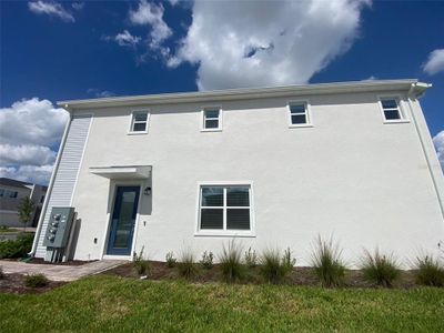 New construction Townhouse house 457 Bogey Drive, Davenport, FL 33896 - photo 0