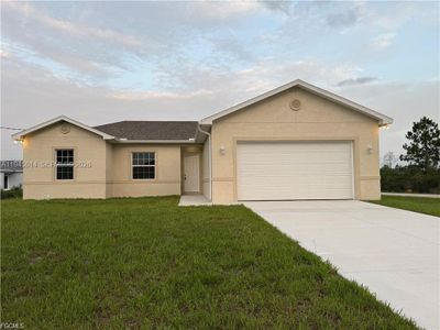 New construction Single-Family house 1926 Zombar Ct, Lehigh Acres, FL 33972 - image