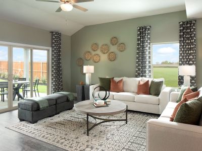 Sliding glass doors highlight this open-concept floorplan and add tons of natural light.