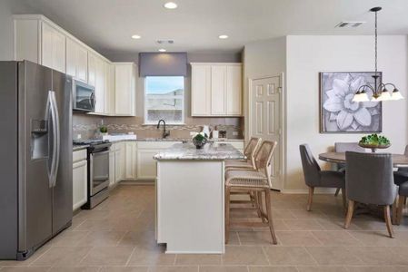 Photo of Pulte model home with same floor plan, not of actual home listed.