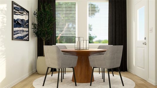 Dining space featuring light hardwood / wood-style floors and plenty of natural light