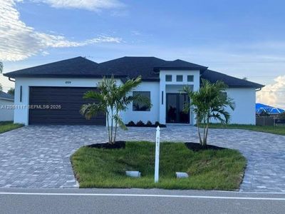New construction Single-Family house 1009 Tropicana Pkwy W, Cape Coral, FL 33993 - image