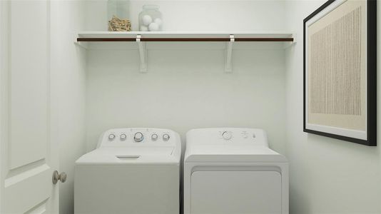 Laundry room featuring washing machine and dryer