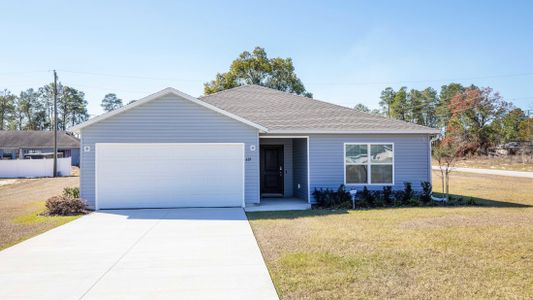 New construction Single-Family house 9518 Bryson Ave, Englewood, FL 34224 plan Marigold - image