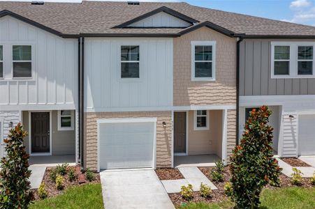 New construction Townhouse house 5967 Chestnut Grove Place, Saint Cloud, FL 34771 Cosmos- photo 0