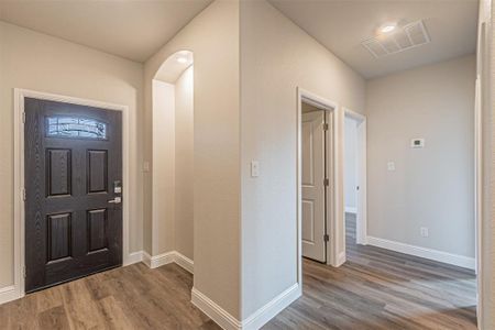 Entryway featuring wood-type flooring