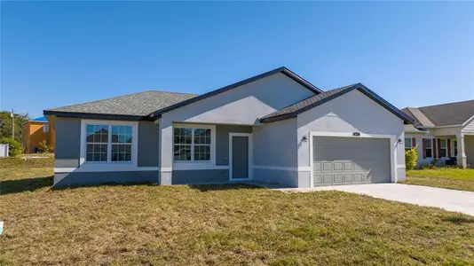 New construction Single-Family house 613 James Ct, Poinciana, FL 34759 null- photo 1 1