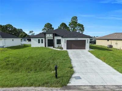 New construction Single-Family house 3306 17Th St Sw, Lehigh Acres, FL 33976 - image