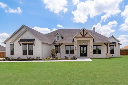 View of front of house with a front lawn