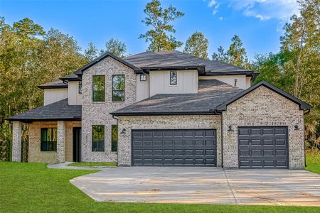 New construction Single-Family house 855 County Road 6324, Dayton, TX 77535 JAXON- photo 0