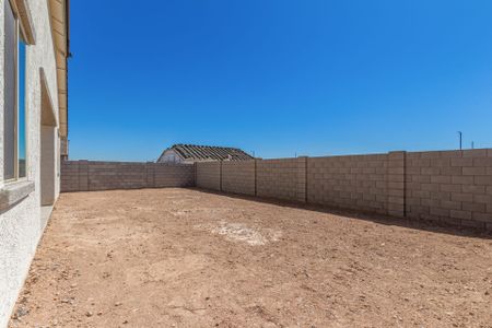 home with backyard and fence