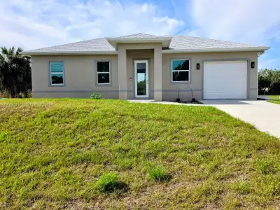 New construction Single-Family house 402 Harrison Dr, Lehigh Acres, FL 33936 - image