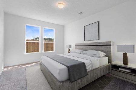 Come and unwind after a long day in this magnificent primary suite! This spacious room features plush carpet, warm paint, high ceilings and large windows with privacy blinds.