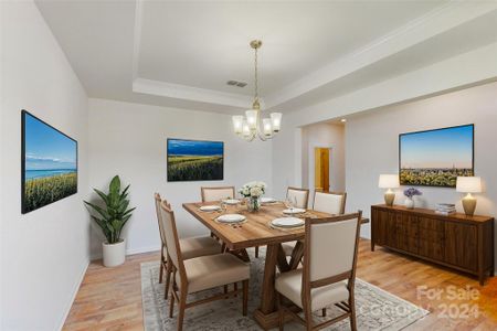 Formal dining room shown with virtual staging