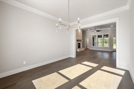 Dining area with crown molding, could be a study!