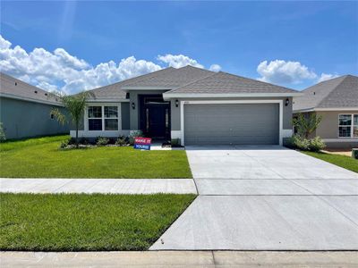 New construction Single-Family house 1266 Tagliamento Lane, Haines City, FL 33844 1820- photo 0