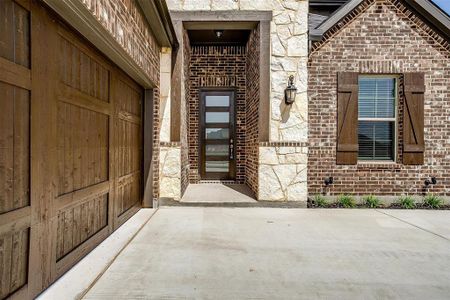 Entrance to property with a patio area