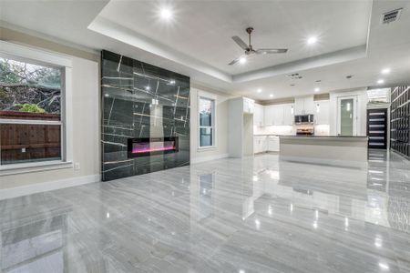 Floor to ceiling tiled fireplace