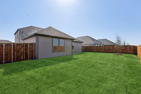 Patio in the Holden home plan by Trophy Signature Homes – REPRESENTATIVE PHOTO