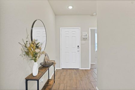 Foyer featuring hardwood / wood-style flooring