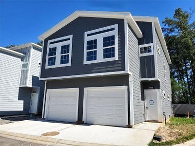 New construction Townhouse house 4939 Dalhart Drive, Spring, TX 77379 - photo 0